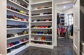 Family Friendly Mud Room With Floor To Ceiling Built In Slanted Shoe Shelves Filling The Corner Alon Closet Storage Design Closet Shoe Storage Shoe Rack Closet