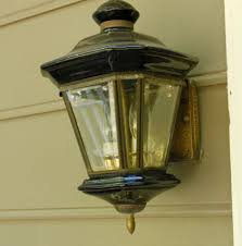 Next to house numbers at front entrance; Installing New Exterior Lighting Pretty Handy Girl