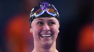 Olympian becomes 1st woman to finish swim to Block Island