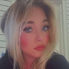 What are people doing sitting in lawn chairs at North 98 Walmart parking  lot?