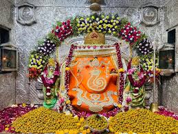 Ganesha adorned with gold ornaments in ...