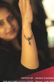 Small Phoenix Tattoo By Akash Chandani Skin Machine Tattoo Studio Skinmachinetattoo Email For App Small Phoenix Tattoos Phoenix Tattoo Feminine Hand Tattoos