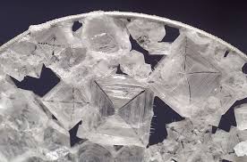 Nacl Sodium Chloride Table Salt Under A Microscope Rock Salt Is Also Known As Halite Mineral Crystal Mytumbl Crystals Salt Crystal Rocks And Crystals