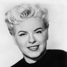 Who wrote “Round About” by Chris Connor?