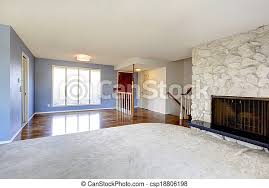 Your home for all things design. Empty Beautiful Living Room With A Rocky Background Fireplace Refreshing Empty Living Room With Blue Walls And Carpet Floor Canstock