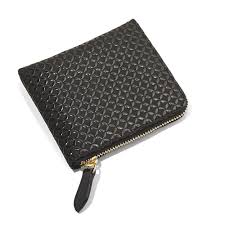 The Inden Ya Coin Wallet Hammacher Schlemmer