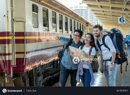 Premium Multiethnic Travelers Are Looking At Train And Holding The Map With Happiness Action At The Railway Station Photo Download In Png Jpg Format Railway Station Vacation Photos Photo