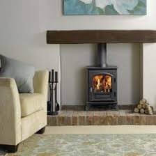 This Is Our Solution To Unusable Fireplaces A Wood Burning Stove Inserted Into The Space Small Wood Burning Stove Wood Burner Fireplace Stove Installation