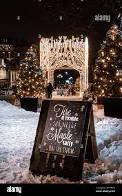 Christmas In Quebec 2021 Montreal Quebec Canada January 3 2021 A Sign Offering Maple Taffy On The Snow In The Place Jacques Cartier In Old Montreal With Christmas Lights Stock Photo Alamy