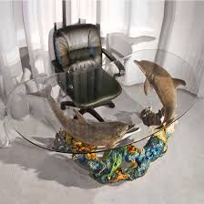 Cast in quality designer resin. Dolphin Consciousness Desk Wyland Worldwide