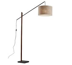 Base is made of metal with antique chelsea sectional floor lamp love this for my sectional family room sofa, right in the middle. Cornelius Wood Arc Sectional Floor Lamp Black Amp Walnut Pottery Barn