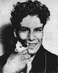 Manuel Ortiz with his cat 1944