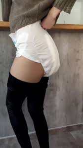 ABDL girl messing diaper under leather pants.. - ThisVid.com