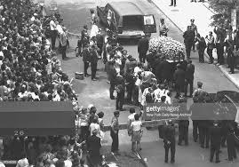 Yellow Roses Cover Judy Garland S Coffin As It Is Taken To Hearse At Judy Garland Funeral Home Nyc