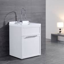 With its heavy duty sanitation sink basin, along with its included faucet, plumbing kit and limited lifetime guarantee, this laundry work center is the ideal solution for your cleaning, sanitizing, washing and drying needs. Ove All In One Laundry Tub And Cabinet Laundry Bathroom Combo Laundry Sink Utility Sink