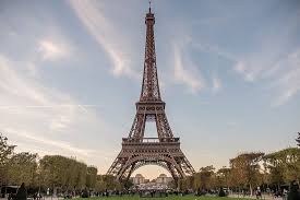 The eiffel tower is surrounded by big lawns where parisians love to sit during spring and summer. Eiffel Tower At Night Beautiful Review Of Eiffel Tower Paris France Tripadvisor