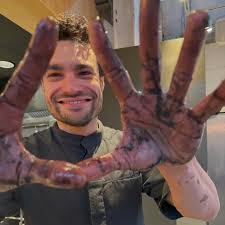 Gazta tarta — the classic Basque Burnt Cheesecake for dessert. This one  isn't overly burnt but, we added squid ink to give it a black hue and a  subtle hint of saltiness