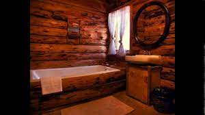 Beadboard is a traditional feature in the bathroom, but by keeping the natural wood coloring, this bathroom has an edgier, rustic feel. Log Cabin Bathroom Designs Youtube