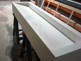 corian sink, restroom design, trough sink