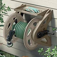 The durable resin construction easily mounts securely to a wall and is built to last. Amazon Com Suncast Resin Outdoor Garden Tote Or Wall Mount Hose Reel Durable Hose Storage Reel With Crank Handle And Lid 100 Hose Capacity Taupe Suncast Hose Reel Garden Outdoor