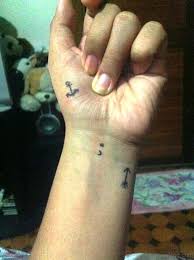 Arrow in rubberband style tattoo on wrist. 35 Adorable Arrow Tattoo On Hand