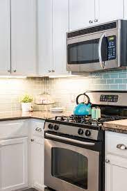 The best way to control this factor (other than replacing your floors) is to put down a light area rug. Easy Ways To Brighten Up A Dark Kitchen Kitchn