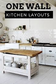 The One Wall Kitchen Layout Has All Appliances Cabinets And Sink On A Single Straight Wall This Is A Fun White Kitchen Rustic One Wall Kitchen Kitchen Layout