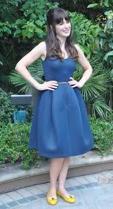 Zooey Deschanel S Navy Pleated Dress And Yellow Flats At The Hollywood Foreign Press Association Press Pleated Dress Pinup Girl Clothing Zooey Deschanel Style