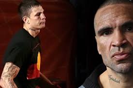 I take my hat off to him': Mundine backs Hooper's flag stance