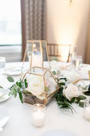 Modern Wedding Reception Centerpieces Glass And Gold Terrariums In Geometric Shapes Fill Modern Wedding Reception Wedding Reception Centerpieces Wedding Modern