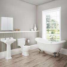 The wood panelling is painted in a rich shade of blue to add some colour to an otherwise neutral scheme. 20 Best Small Bathroom Design Ideas For Small Spaces