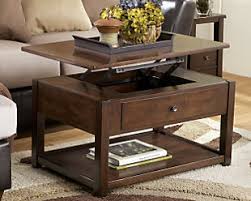 Porter coffee table with lift top. Rafferty Coffee Table Ashley Furniture Homestore