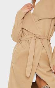 Style yours with some cute ankle boots and you're ready to slay all day! Maxi Oversized Waterfall Belted Coat Tops Prettylittlething Qa