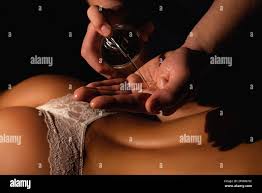 Body massage oil hi-res stock photography and images - Alamy