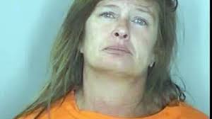 Woman arrested, accused of stabbing man