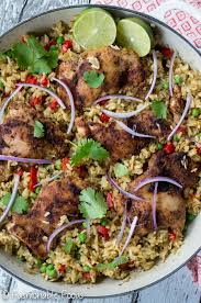 Once the chicken is cooked, remove the tin from the oven and squeeze the garlic out of their skins. One Pot Salsa Verde Chicken And Rice Fashionable Foods
