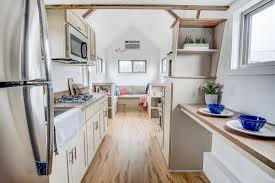 Small kitchens may appear to be a design challenge, but they can also be functional, stunning and efficient. Tiny House Kitchen Design Tiny Home Builders