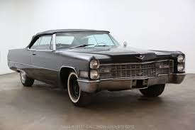 The first cadillac using the name in production was in 1949 for their hardtop series 62 coupe deville, the first pillarless coupe/sedan gm produced. 1966 Cadillac Deville Convertible Beverly Hills Car Club