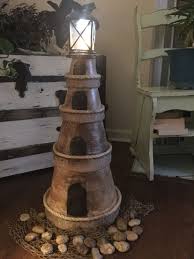 See more ideas about lighthouse art, watercolor print, lighthouse. 42 Lighthouse Ideas Lighthouse Lighthouse Crafts Clay Pot Lighthouse