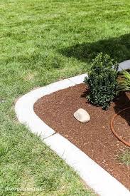 Curbs provide a barrier between your lawn or sidewalk and the road. Install Concrete Landscape Edging Aka Concrete Border Twofeetfirst