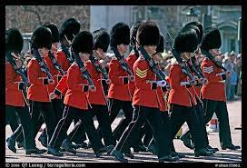 Guards With Tall Bearskin Hats Marching Near Buckingham Palace London England United Kingdom Buckingham Palace Royal Guard Guard