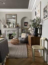 The neutral linen shades of the rug, table, and couches go with the flow and provide a soft backdrop to the blues. Five Things I Love Giving The Living Room An Update Designsixtynine