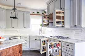 Whether you have chosen solid wood doors, md, particle board or ply for your kitchen cabinets, there are a variety of finishes that you can use to achieve the look and functionality you want. Storm Af 700 Gray Painted Cabinets With Warm Natural Walnut Accents Farmhouse Kitchen Dc Metro By Kim Johnson Designs Llc Houzz