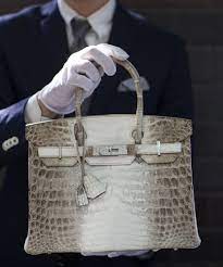 What is the most expensive handbag ever sold? Crocodile Diamond Birkin Expensive Handbags Most Expensive Handbags Expensive Purses