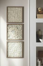 Odella Wall Decor Set Of 3 Ashley Furniture Homestore In 2021 Paper Wall Art Wall Decor Set Frames On Wall