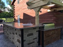 Building one is far less expensive than remodeling an indoor one way to get around building a permanent brick or stone edifice is to buy a prefabricated modular outdoor kitchen. Custom Outdoor Kitchen Builder Poolside Water Feature Builder Fire Features