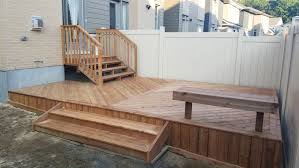 The added trim color on the balusters adds a pleasing look to this. 14 X 20 Pressure Treated Wood Deck Modern Deck Ottawa By Mjolnir Construction Houzz