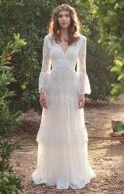 10 Beloved Wedding Dresses For Future Hippie Brides 10 Hippie Wedding Dress With Long Flared S Hippie Bride Wedding Dress Long Sleeve Trendy Wedding Dresses