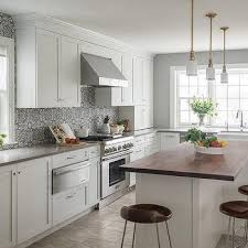 Our worktop savers are available in all different sizes, and materials, giving you fantastic choices whatever your design preferences. Grey Kitchen Cabinets White Countertops Design Ideas