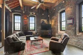 Brick floors, just like wooden floors, have a certain unique charm. Living Room With Lots Of Brick Wood And Sunlight In Atlanta Georgia 1600x1067 Roomporn